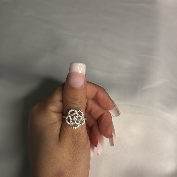 This elegant floral silver ring adds white diamonds. Size 5.5 new. - Picture 1 of 8